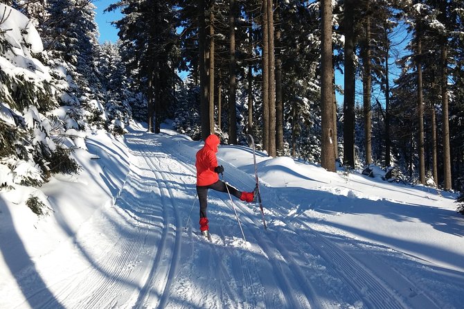 Cross-Country Skiing Guided Tour From Prague - Getting fitted for skis in the Jizera Mountains