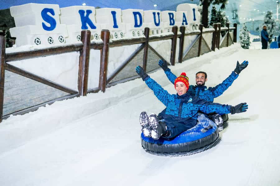 Dubai: Ski Dubai Snow Park Classic Pass - Getting dressed for a cold indoor day