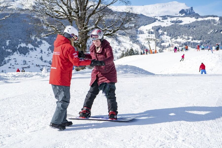 From Interlaken: Grindelwald Beginners Snowboarding Lesson - Looking Up at the Eiger While You Practice