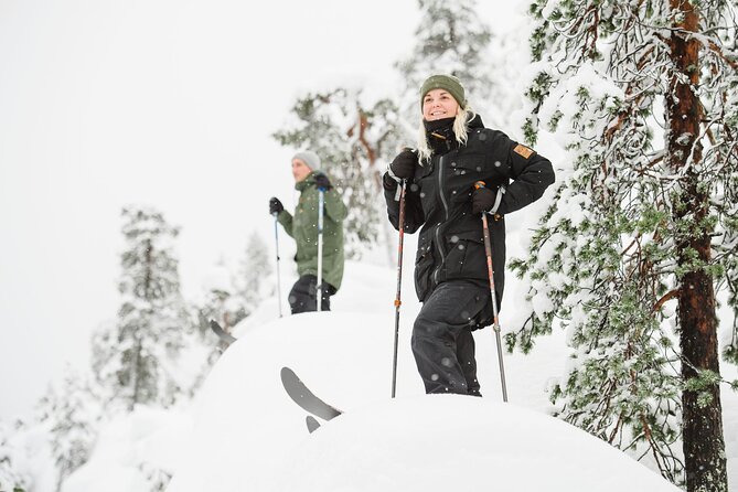 Premium Wilderness Skiing in Pyhä-Luosto National Park - A forest fire, berry drinks, and a light meal