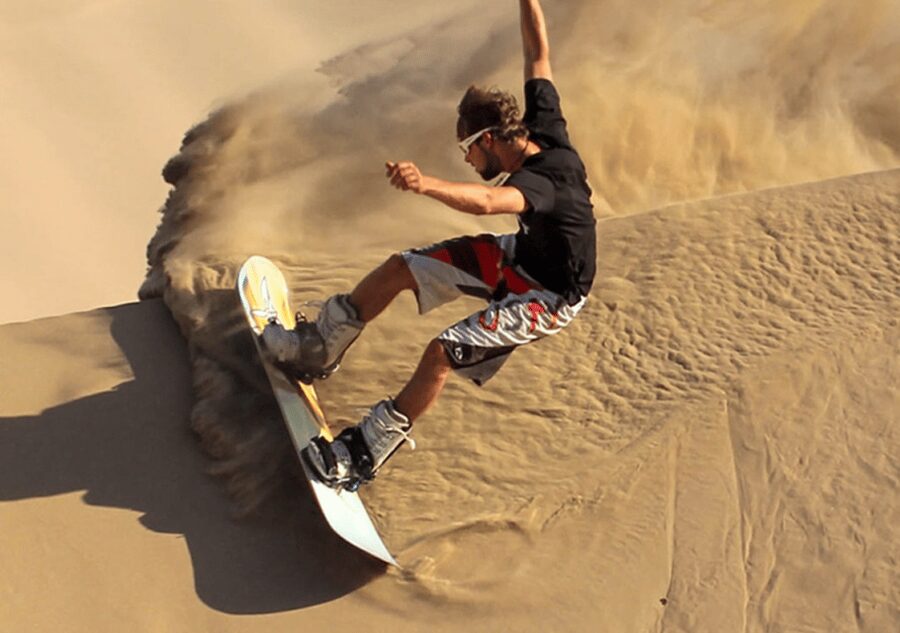 Pro Sanboarding or skiing in Huacachina from Lima - Day trip - Sandboarding with boots and a helmet