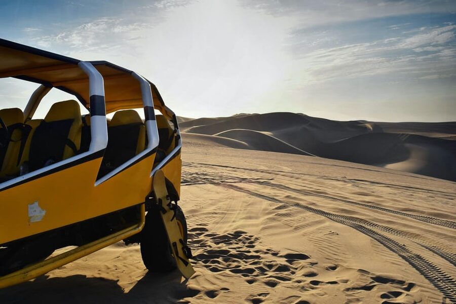 Pro Sanboarding or skiing in Huacachina from Lima - Day trip - Sunset over the dunes