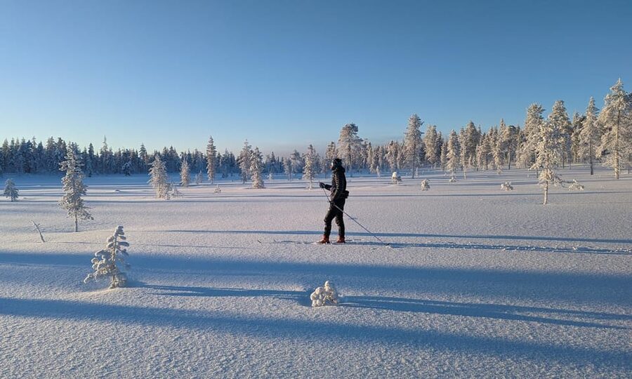 Saariselkä: Back-Country Skiing Guided Tour - Getting fitted with wide back-country skis